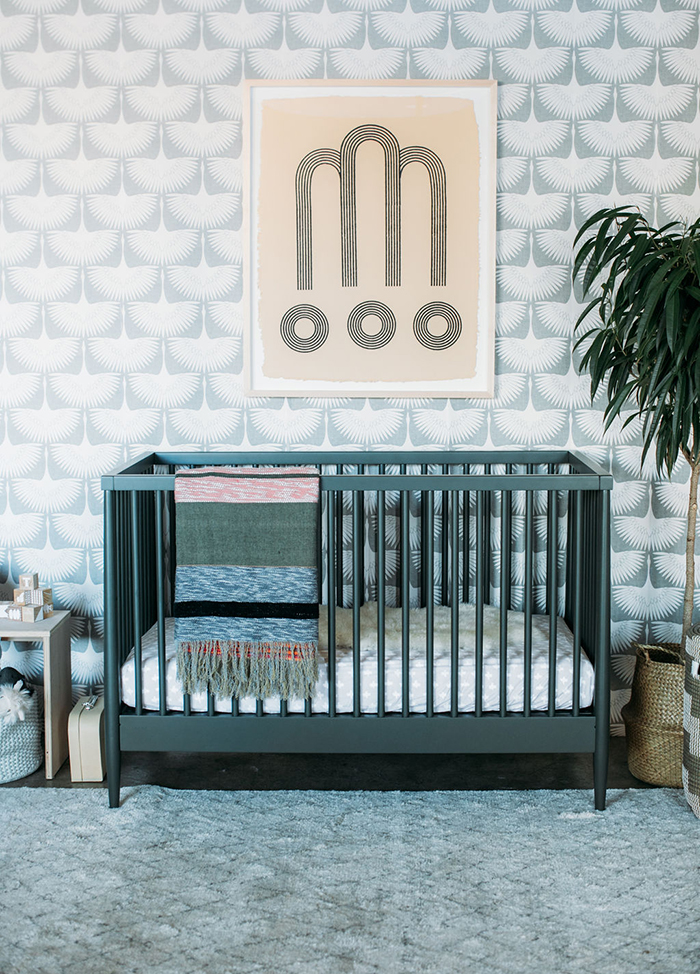 Sophisticated modern nursery with an olive green crib on 100 Layer Cakelet